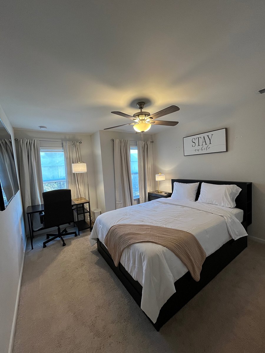 Bedroom 3 includes desk, queen, 4 drawer storage bed, black out curtains, large smart tv and wide closet