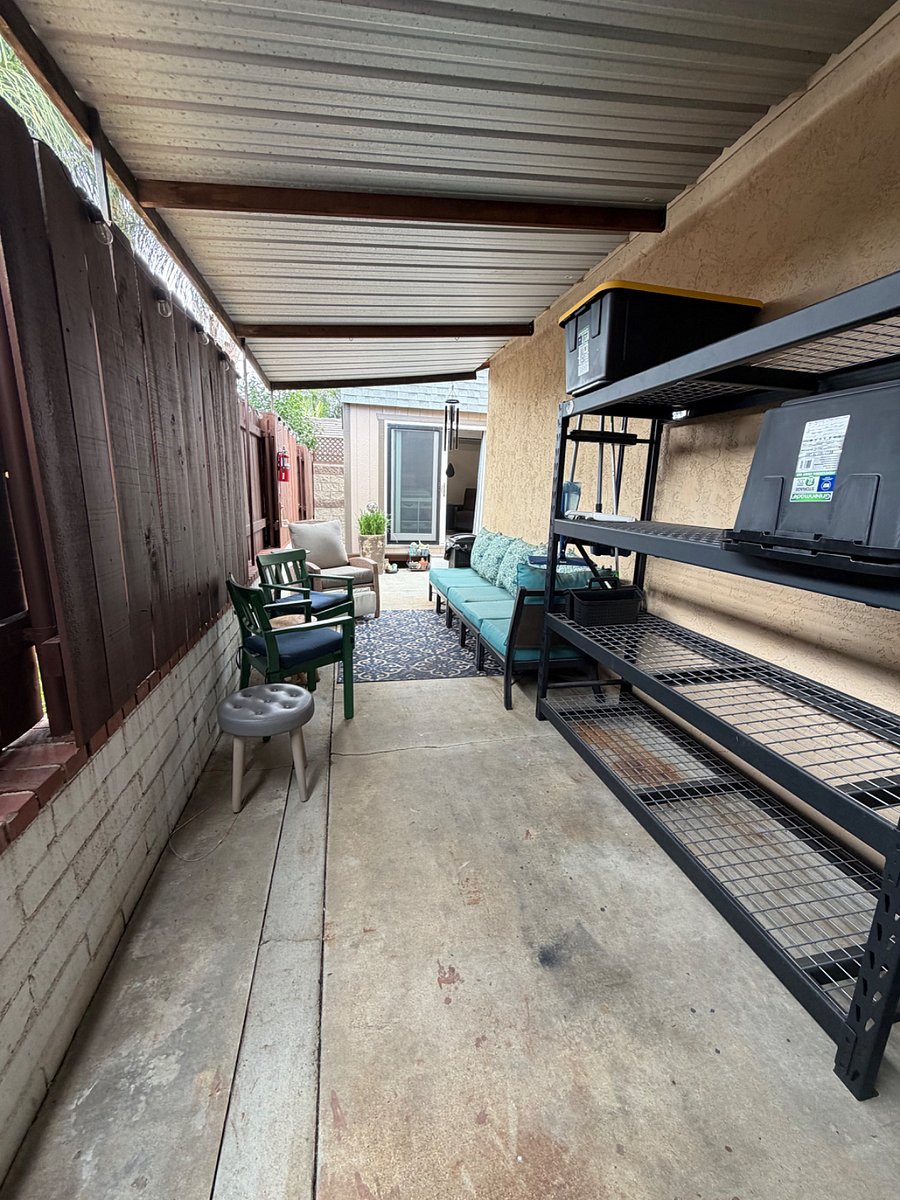 Outdoor seating area with storage area. 