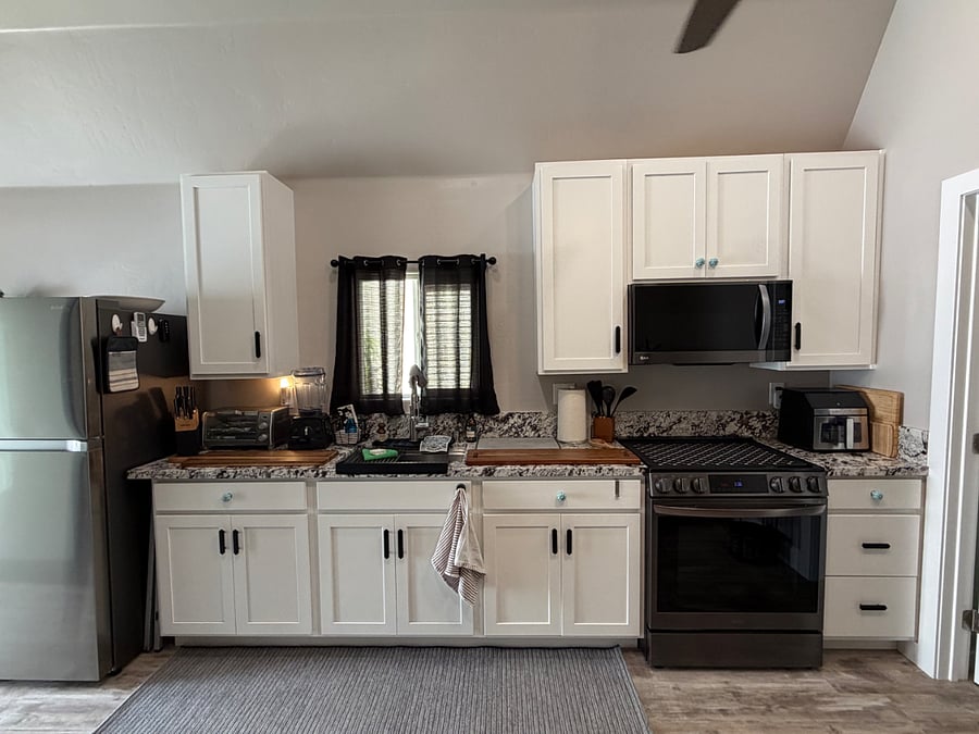 Kitchen area including, Vita-Mix blender, toaster, cutting boards, and all kitchen essentials. 