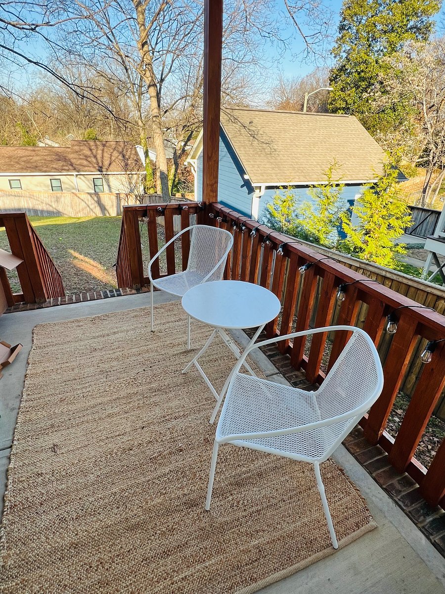 Patio looking to the fenced back yard