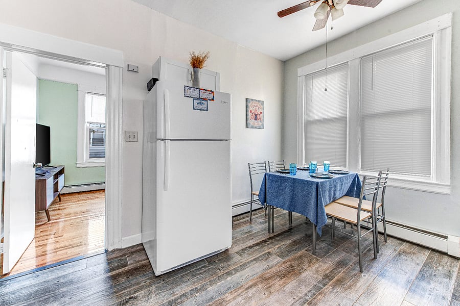Shared partial kitchen and dining area right outside your room