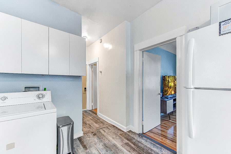 Right outside your private room is the shared living and dining room. Complete with a washer and dryer