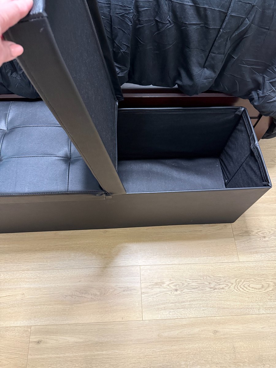 Additional storage at foot of bed, shown with one side opened (both sides open)