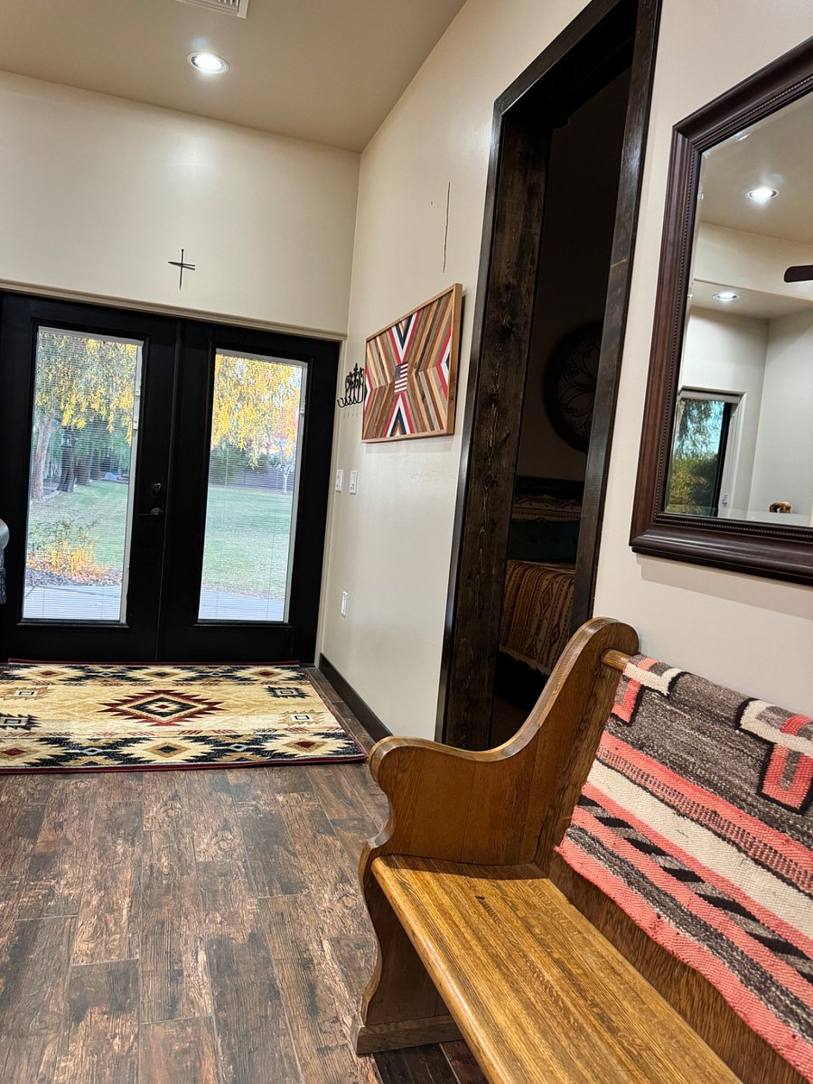 Beautiful view to patio and overlooking shared private yard for property that is gated