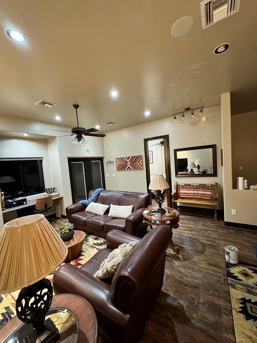 Family room looking towards primary separate bedroom area.  Bath is accessible from bedroom