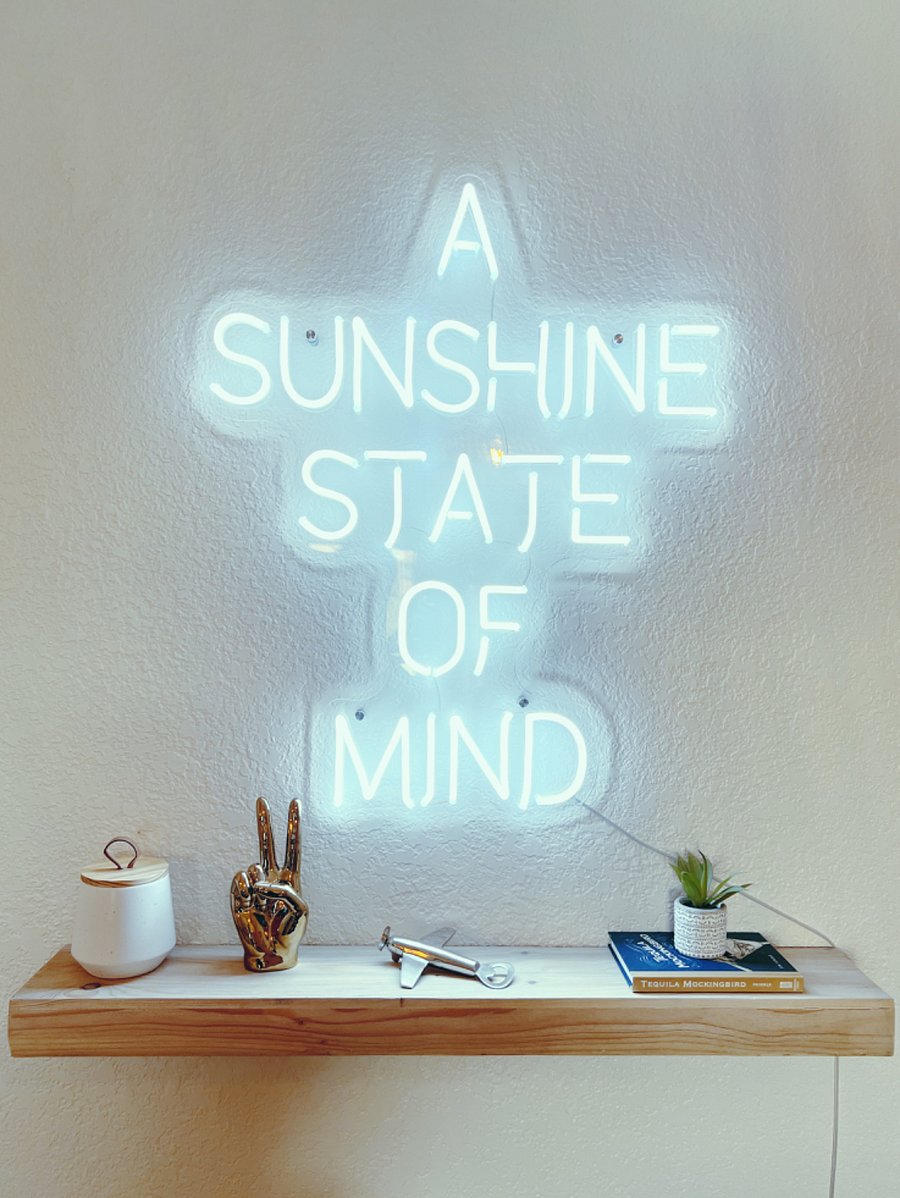 A fun neon that lights up the dining room, reminding you to smile!
