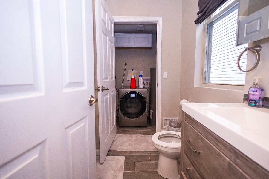 In-unit washer (all-in-one washer and dryer). Full bathroom.