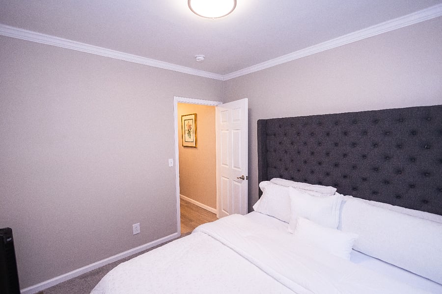 King size bedroom #2 with full closet and mirror.