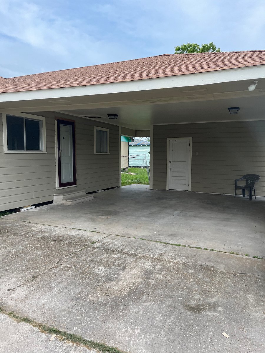 Carport with Enclosed Storage Shed