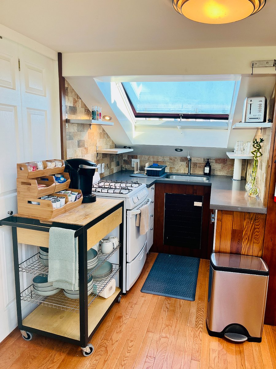 Kitchen- tiny but has everything you need! Full refrigerator is not shown in the photo