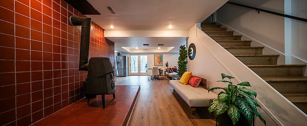 Wood-burning stove keeps the space cozy.