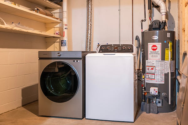 The unit has it's own washer / dryer. These are in a shared storage space, but I only go down to check the water softener & HVAC units.