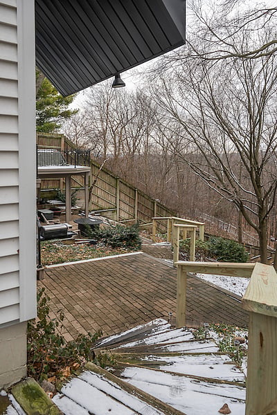 There are several small steps to get to the apartment entrance on the lower-level patio.