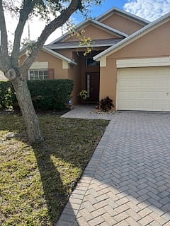 Front entrance with driveway parking