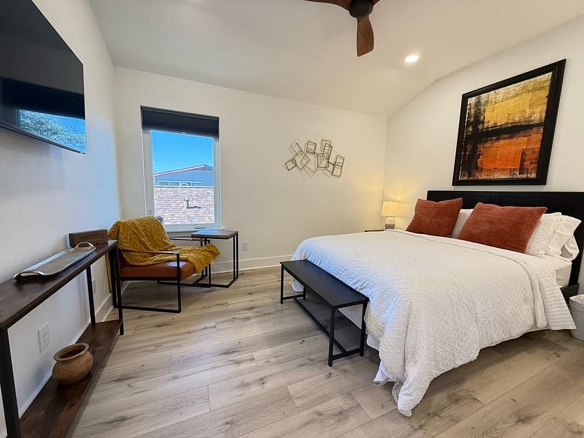 Cozy and comfortable, the Amber Room offers a relaxing space with a queen-size bed, TV, and basic exercise equipment.