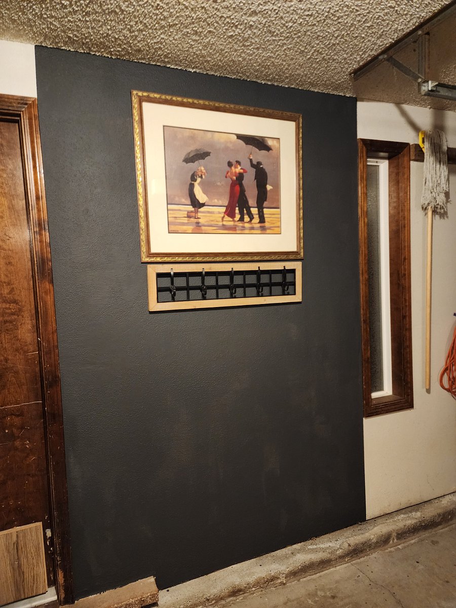 Coat rack inside garage.