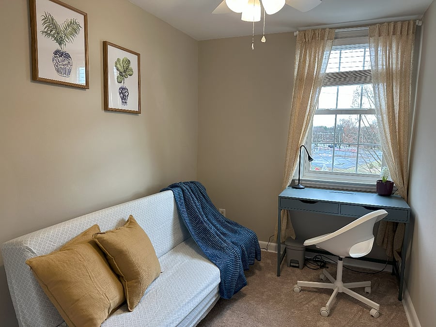 Your own office with computer desk, table lamp and office chair.