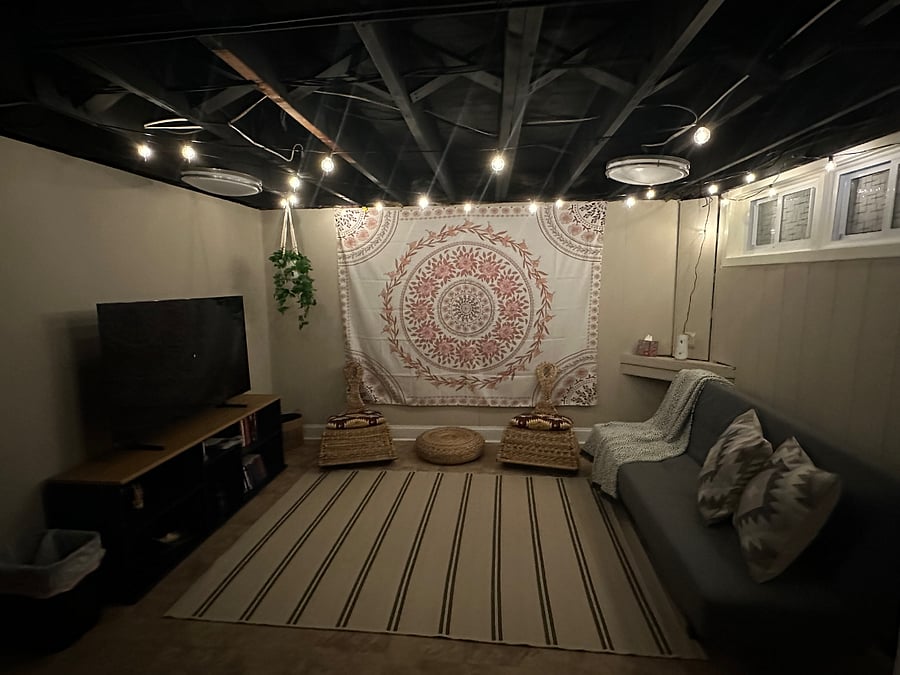 Have a great movie night in our Boho inspired room downstairs with a 55 inch smart TV.