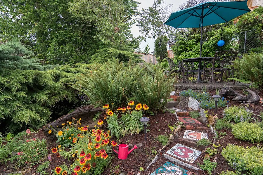Walk down the side of the house and enjoy the garden area.
