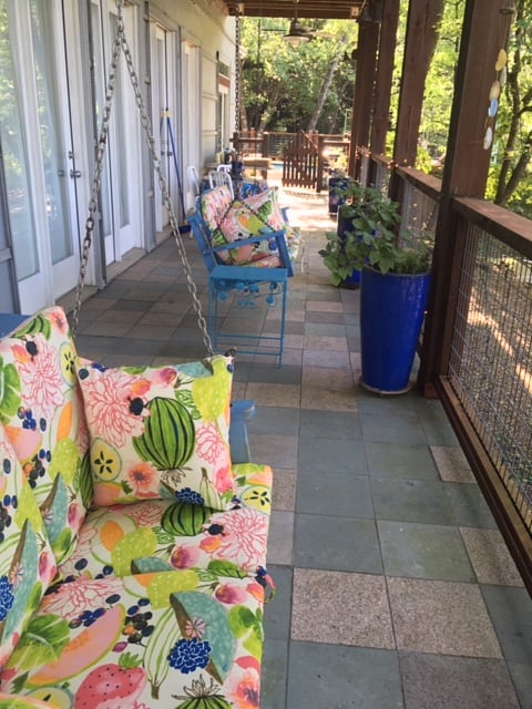 Porches of main house are utilized and adjacent to Cozy Poolside Suite! 2 porch swings, lots of relaxing space!