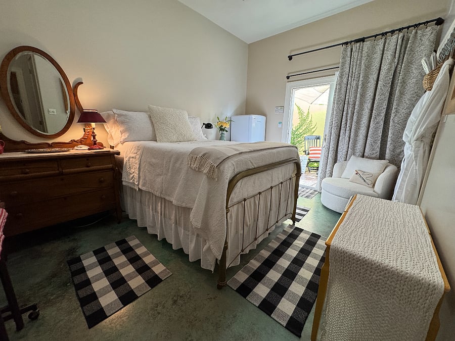 Poolside Suite bedroom w/ full sized antique bed, comfy mattress.