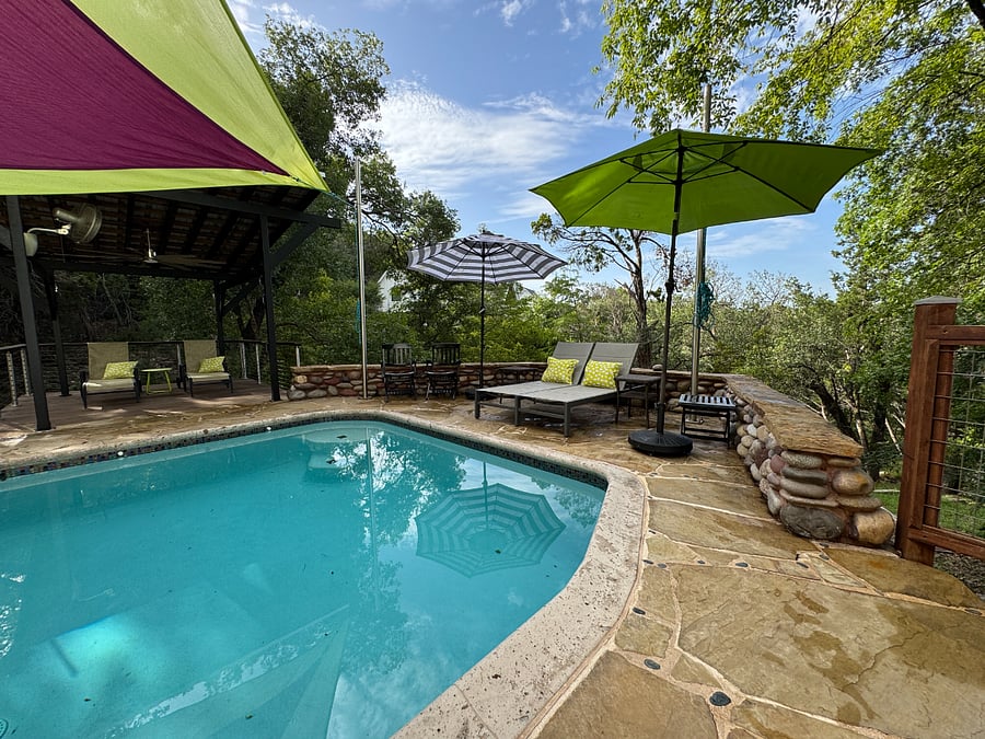 Pilates with loungers, umbrellas, pergola