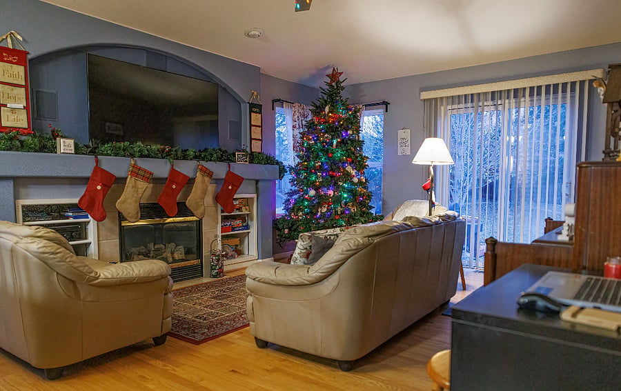 Living room with gas fireplace and 65" Sony TV
