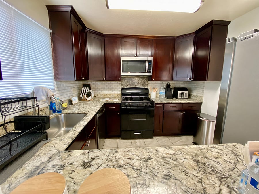 Kitchen complete with new refrigerator/freezer, dishwasher, microwave oven, Keurig coffee maker and air fryer