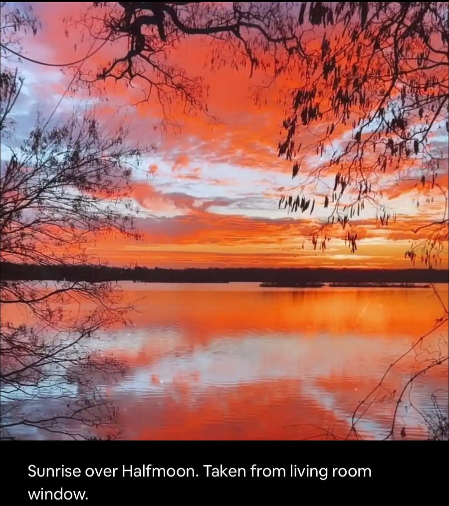 Sunrise over half moon lake from living room