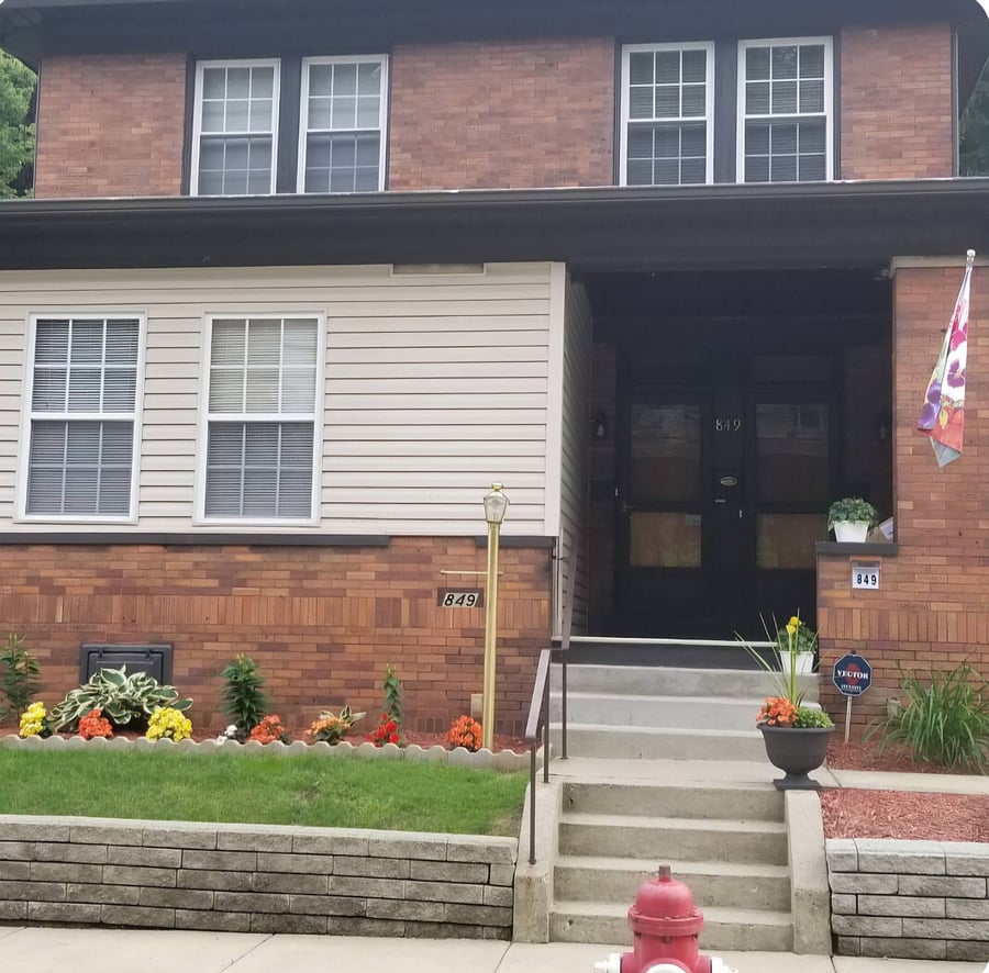 Beautiful 1920's Craftsman with Stain glass windows and cherry wood moulding. Separate Entrance for both floors.