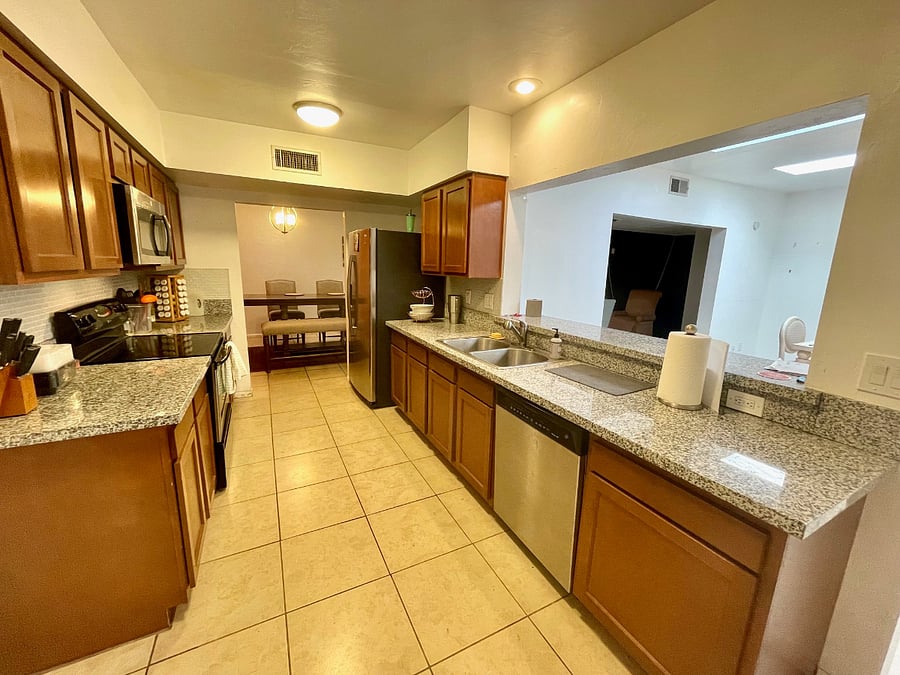 Huge chef's kitchen opens up into both dining areas