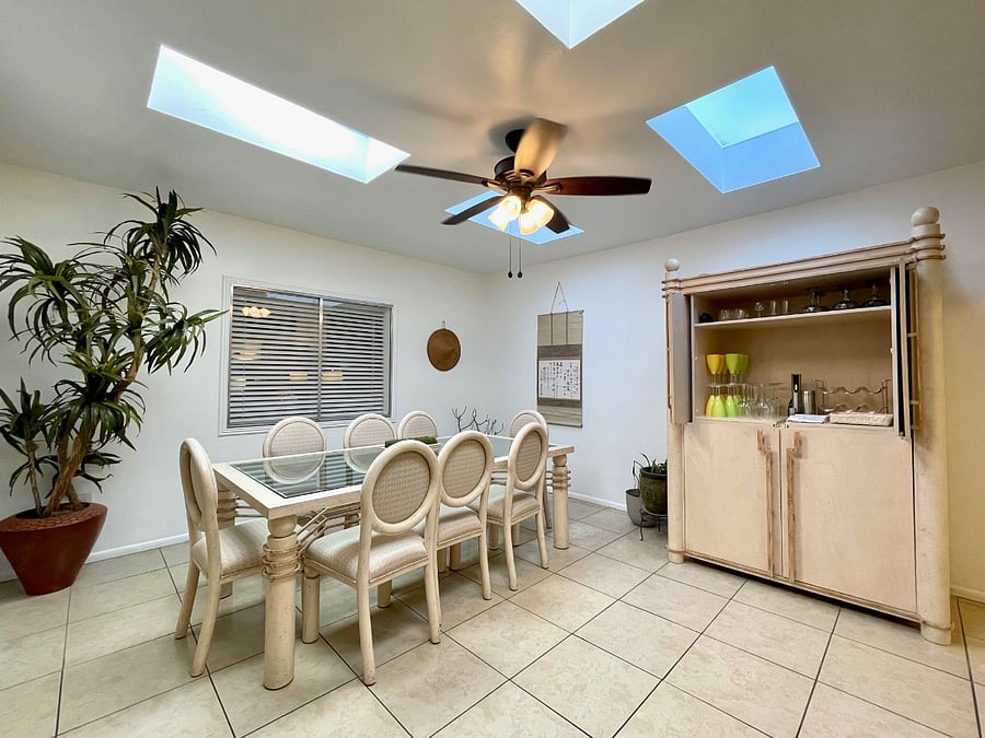 Dining room with large entertainment cabinet 