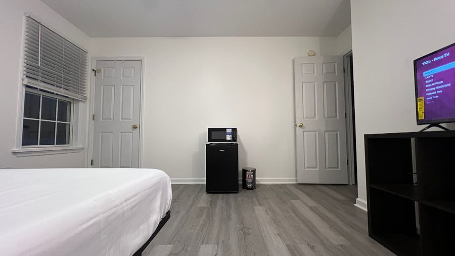 Refrigerator, freezer, microwave and trash can