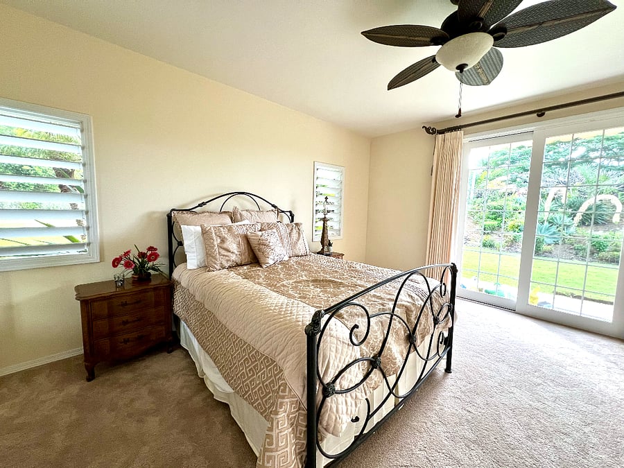 Bedroom #2 with shared bath and private patio on lower level