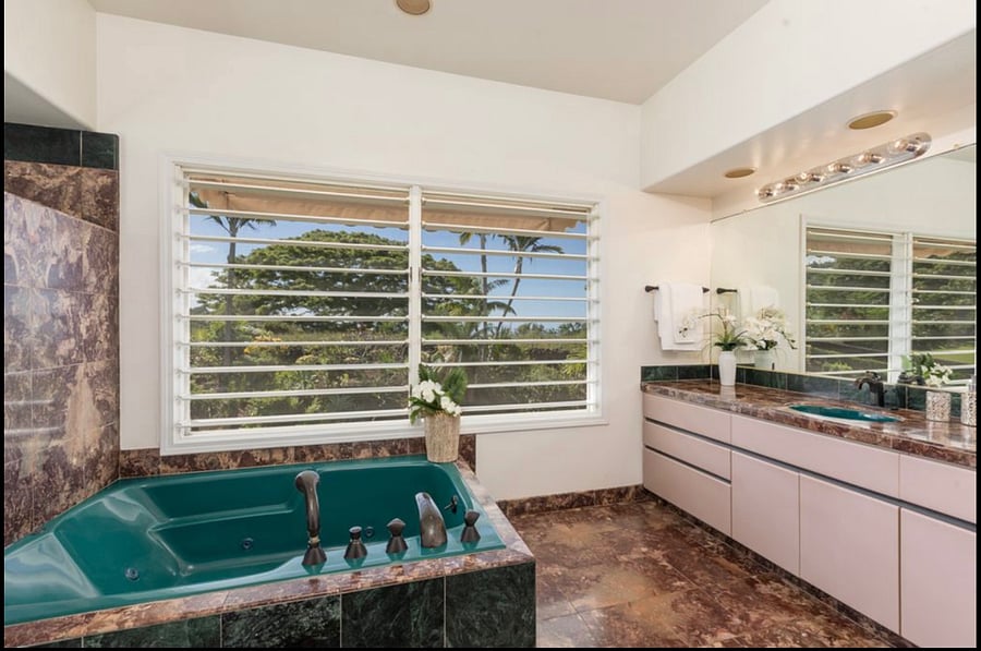 Primary bathroom with jetted tub and walk in shower