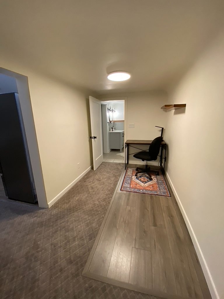 Office nook with wall-mounted shelves