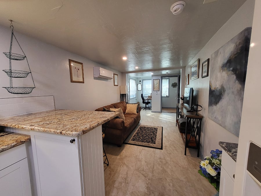 Looking from the kitchen to the living room area- WiFi and Smart TV, too!