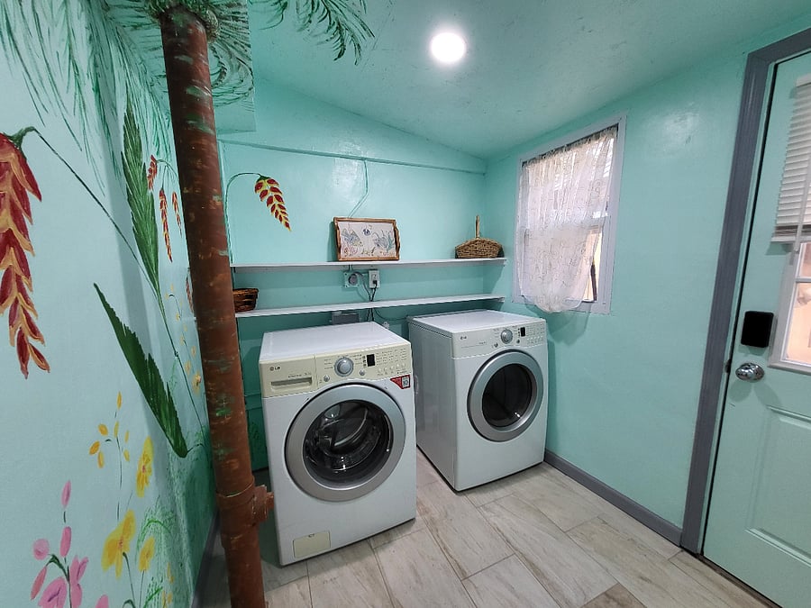 Full sized dedicated laundry area with heavy duty, large capacity machines