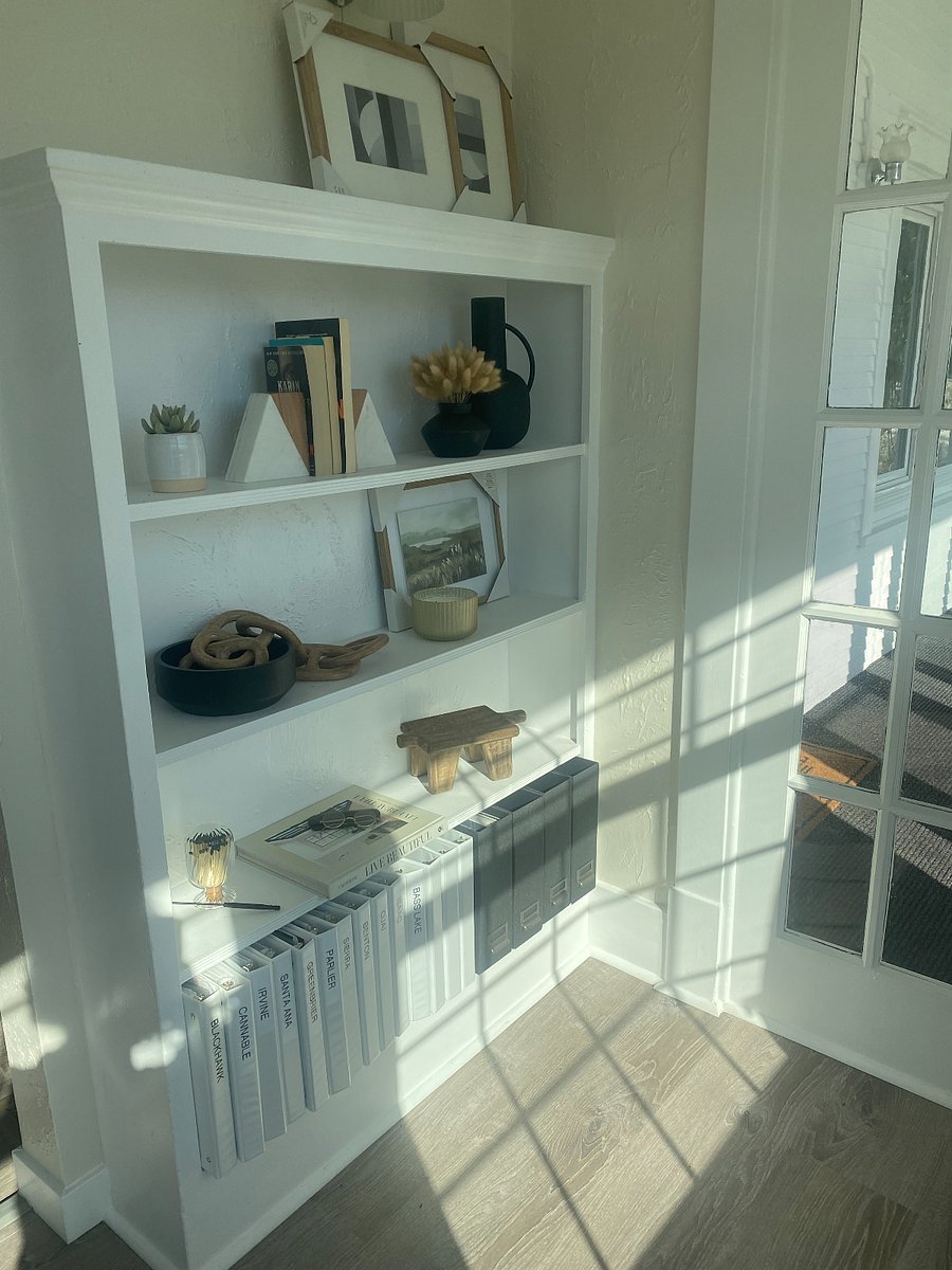 Cozy up with a book in the bright sun room.