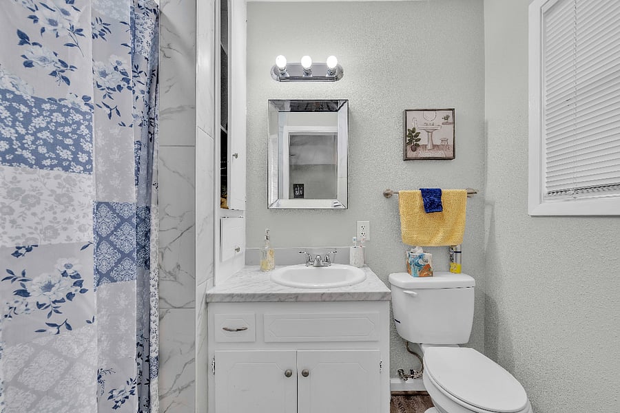 master bath with walk in shower. Hair dryer, and toiletries supplied for a while until you can get your own.