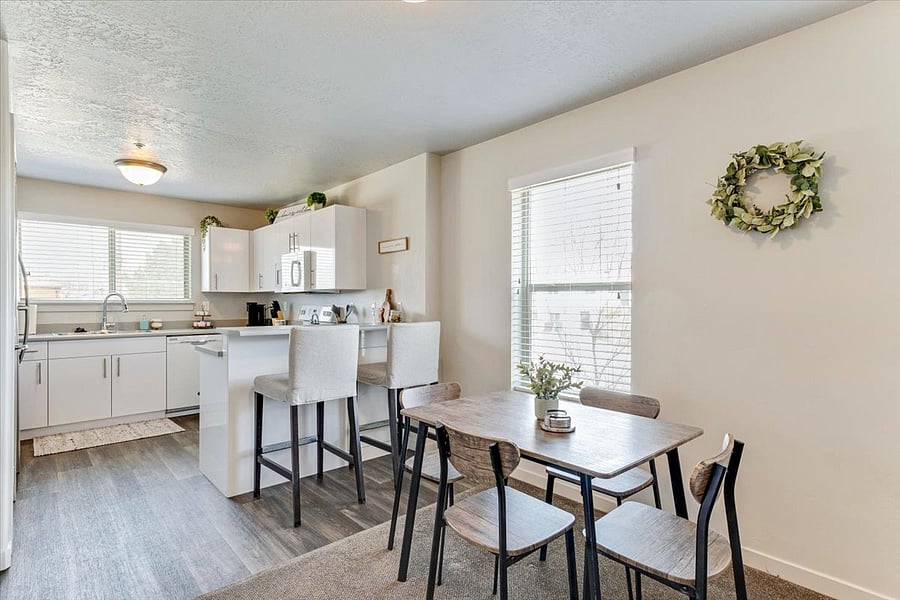 Dining table seating for 4 & barstool seating for 2.
