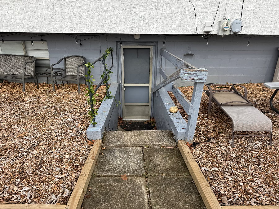 Private entrance through backyard from outside 