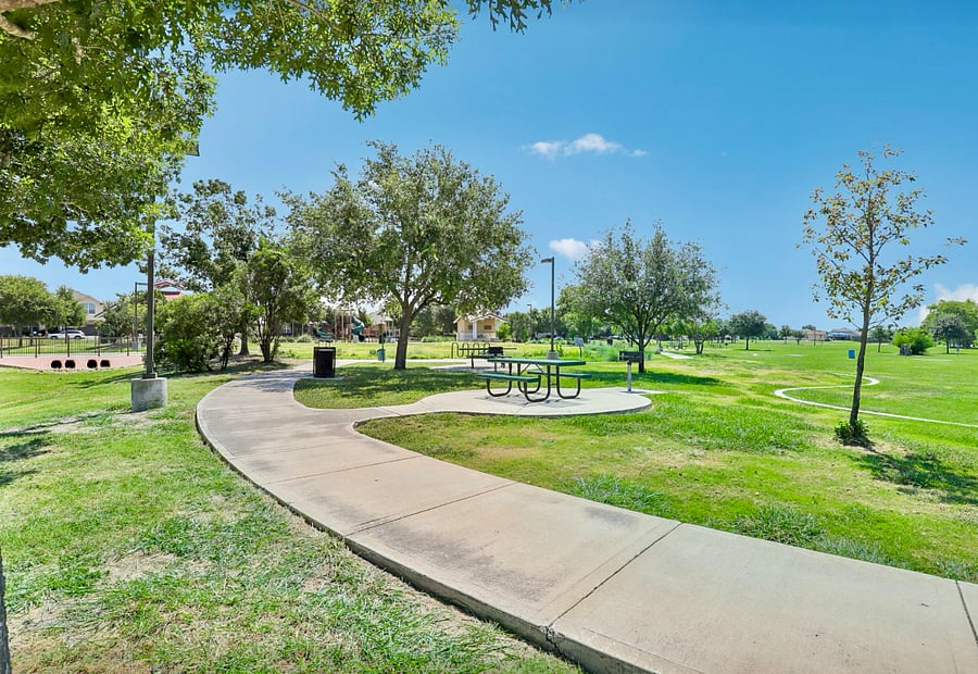 Neighborhood is adjacent to a large park with two miles of paved walking trails, a playground, and covered pavilion.