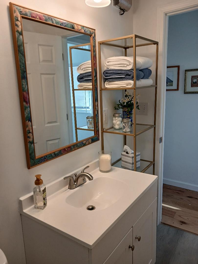 Bathroom vanity and storage shelves
