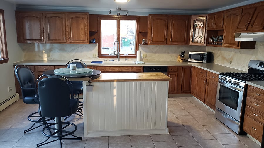 Fully stocked Kitchen with Island and additional bar height seating