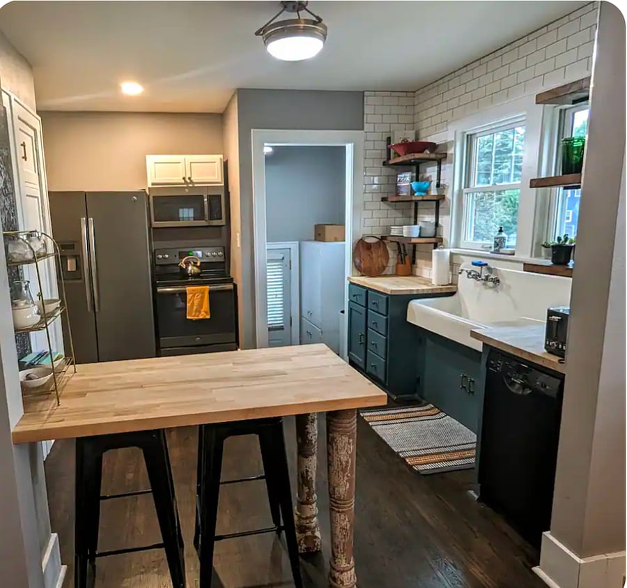Newly remodeled kitchen with all new appliances, a Keurig and classic subway tile.