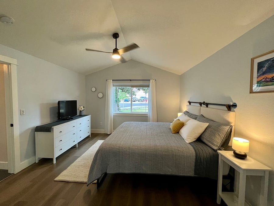Ensuite primary bedroom with walk in closet.