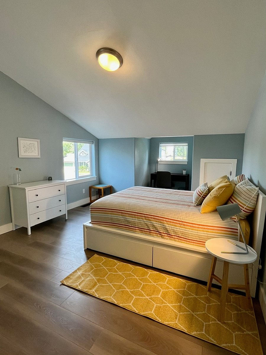 Upstairs bedroom 1, queen bed and two closets.