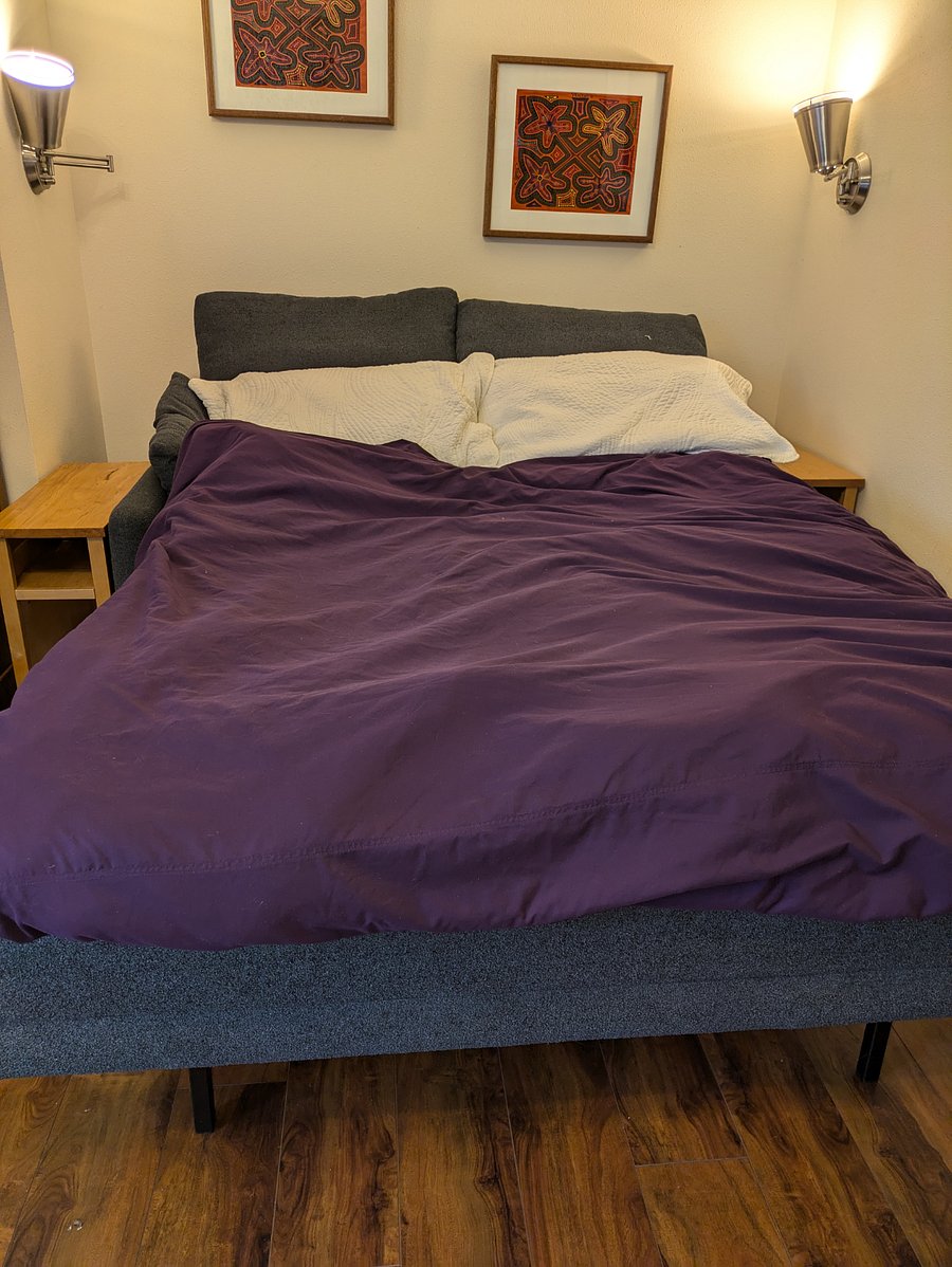 Couch converts to full size bed with comfy tempur-pedic mattress topper.