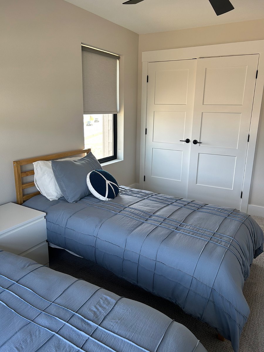 2nd Bedroom with dresser, desk and 2 twin beds
